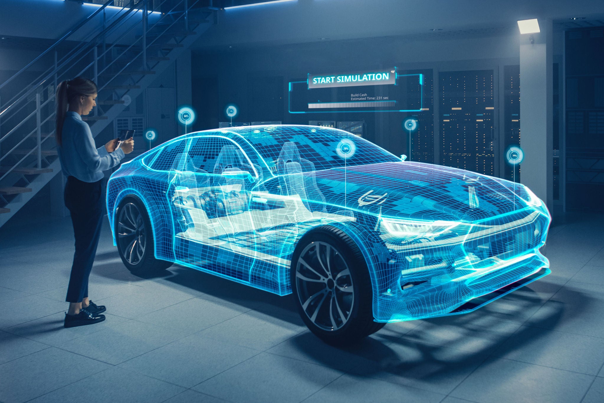 woman inspects concept car via ar on tablet device