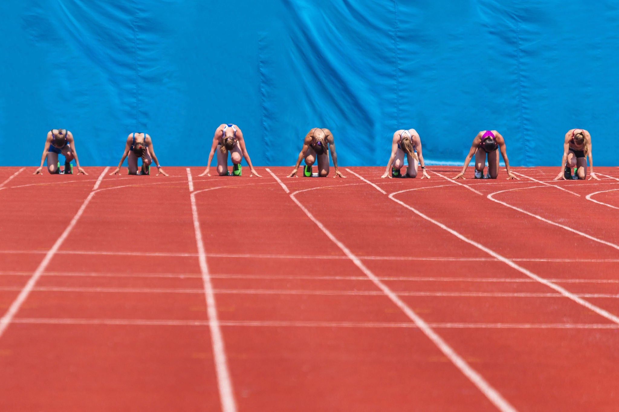 Sprinters getting ready to start