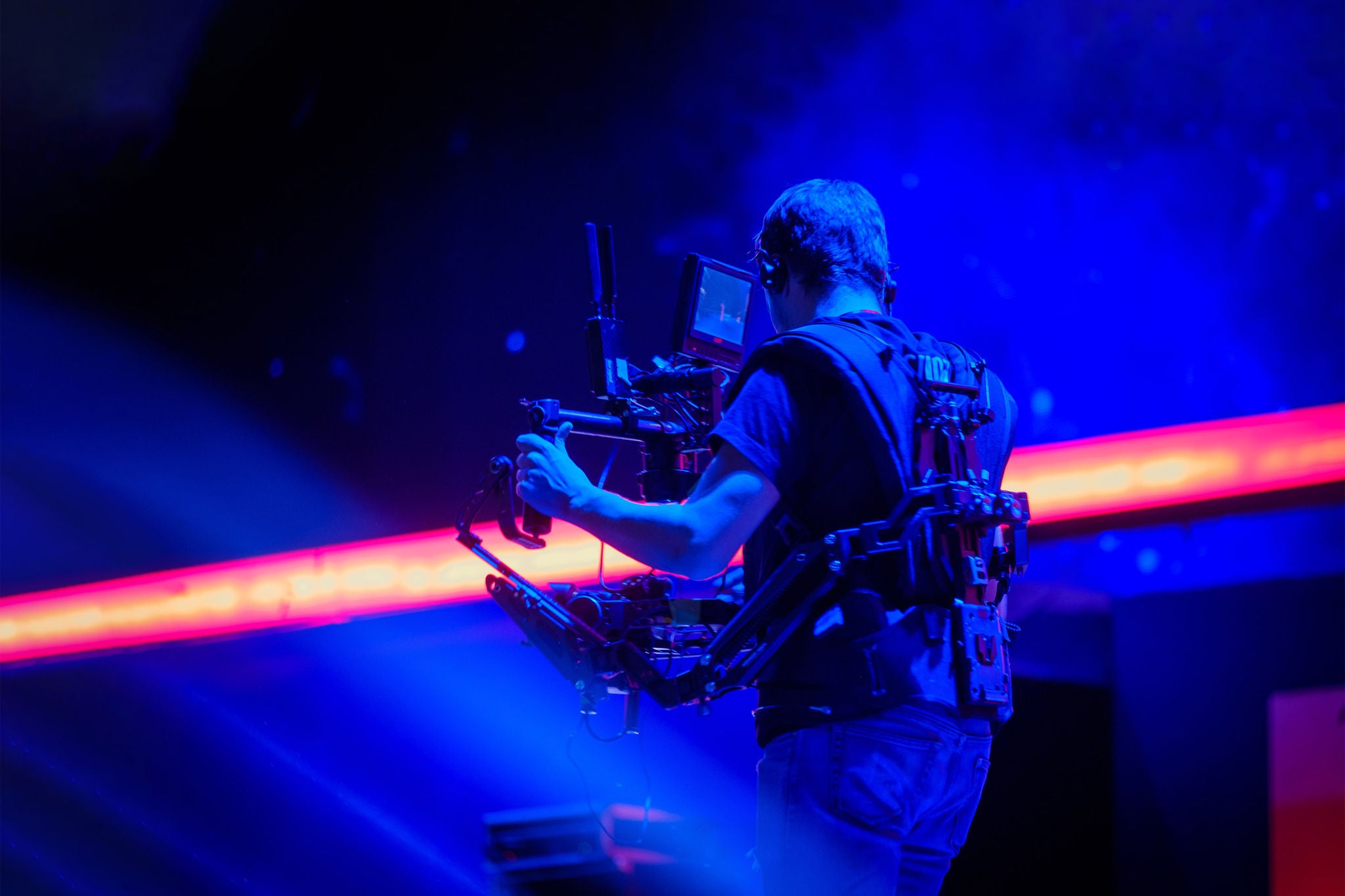 Steadicam man working on stage at concert