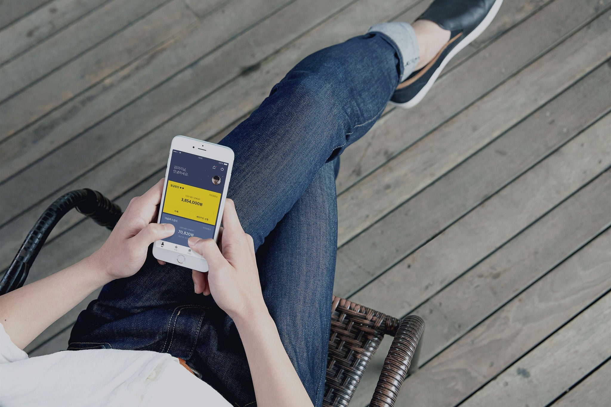 Man checking in kakao bank app in mobile
