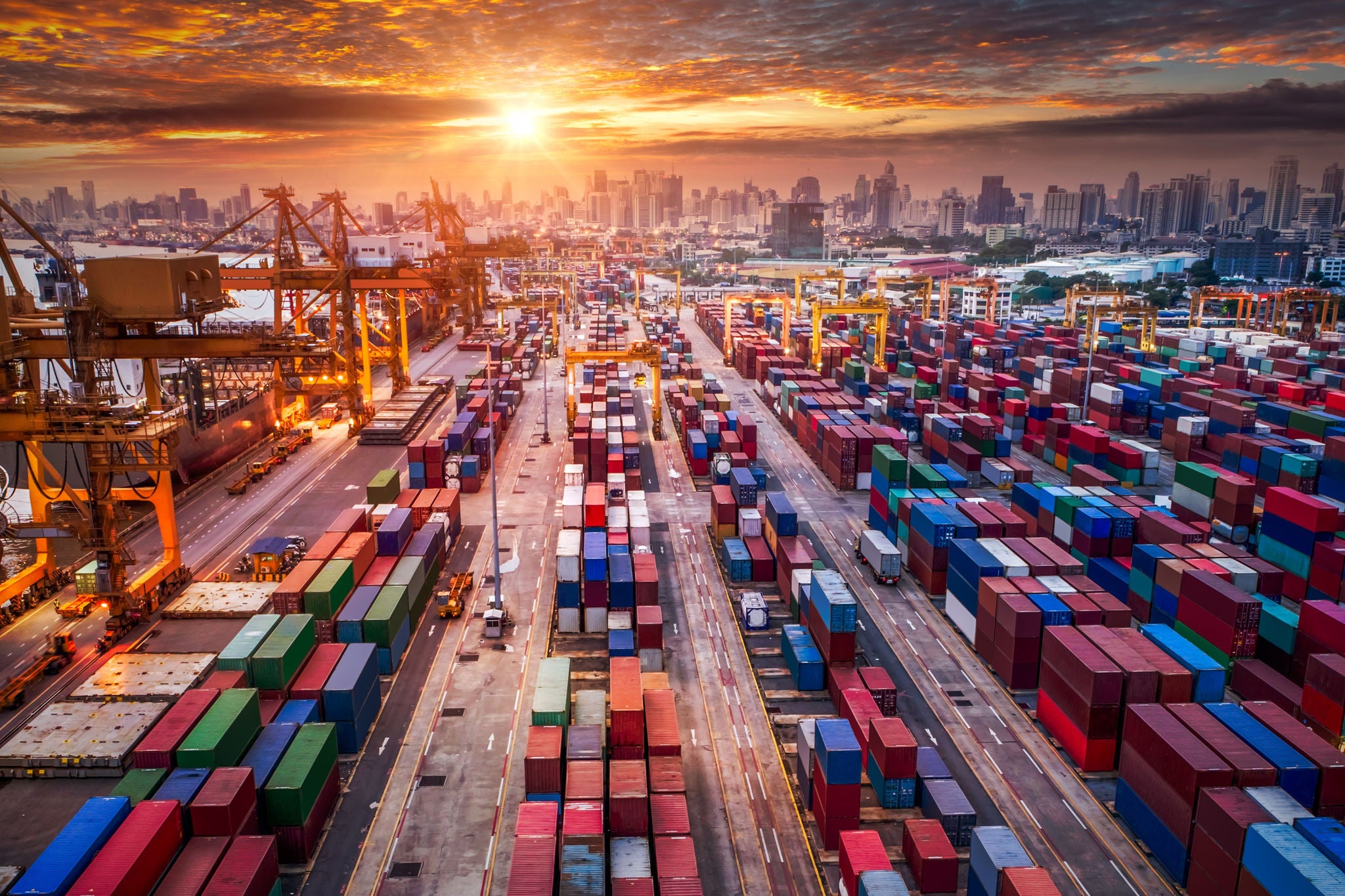 Container ship in import export and business logistic, By crane, Trade Port, Shipping cargo to harbor, Aerial view from drone, International transportation, Business logistics concept
