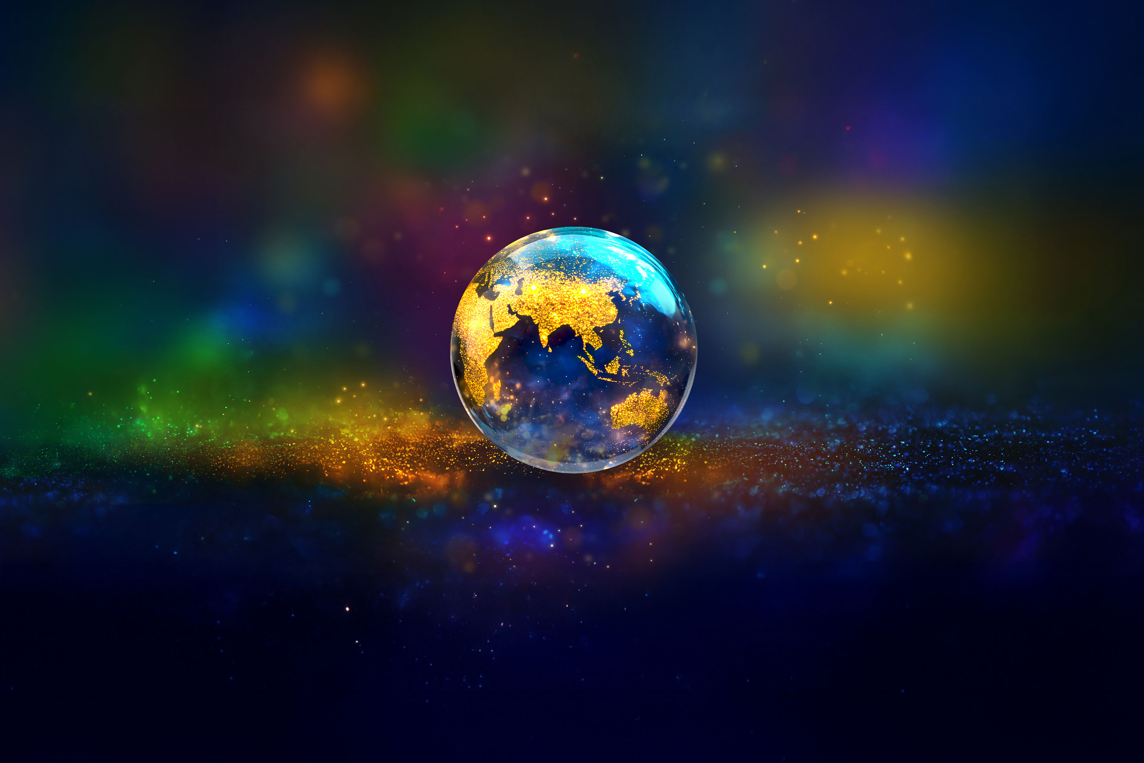 Glass globe with gold glitter continents floating in space background